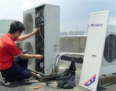 重庆海尔中央空调维修保养公司/重庆海尔办公楼空调清洗维护加氟电话